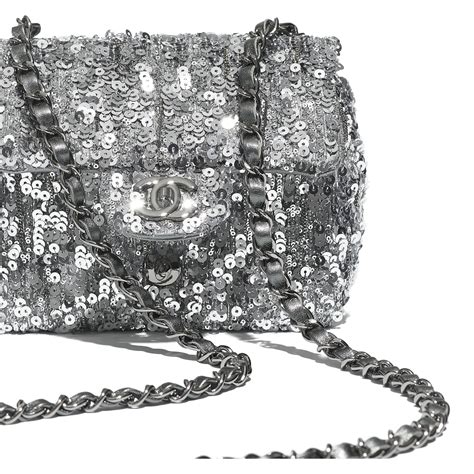 precision chanel backoack black with sequins|Small flap bag, Sequins, black, white & silver .